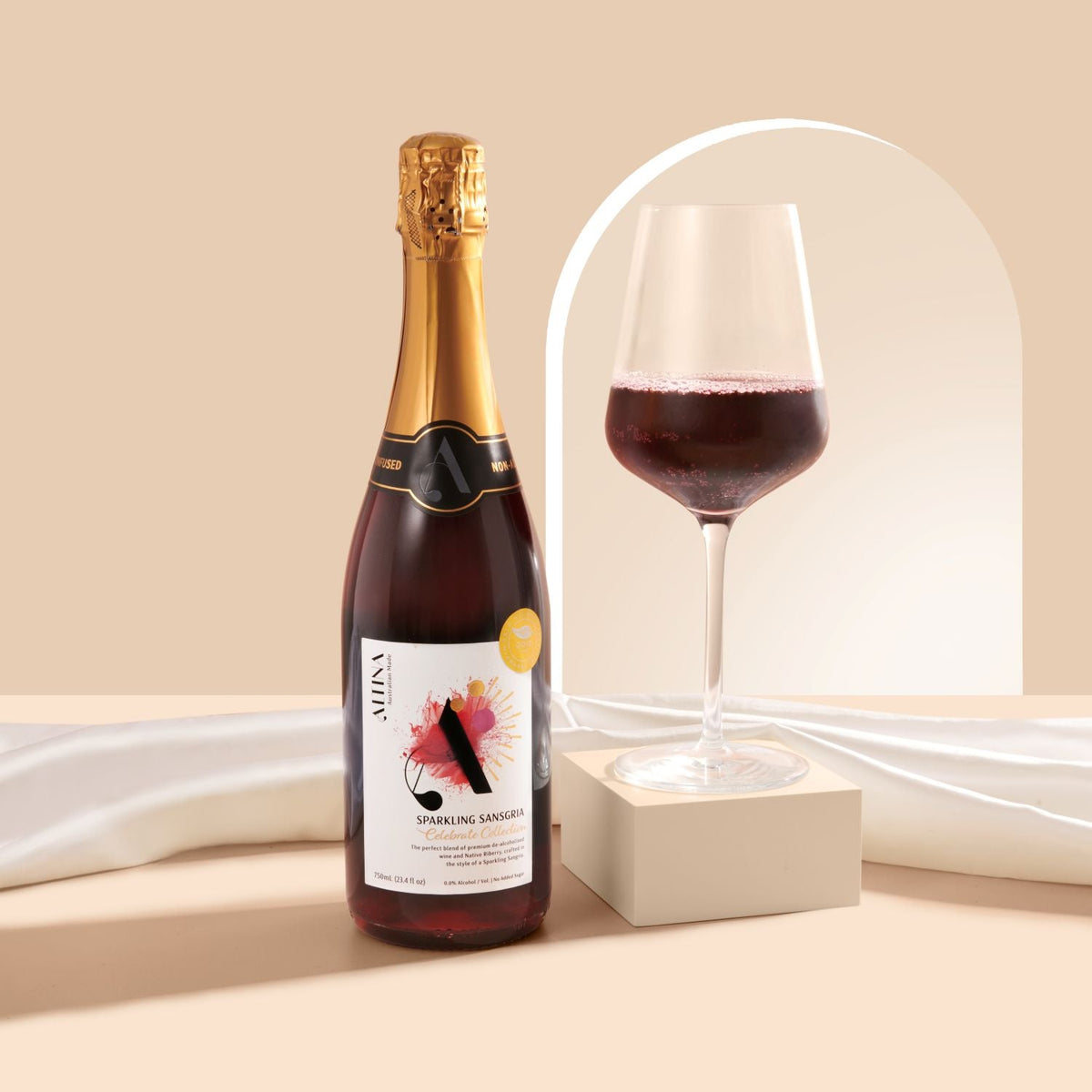 Altina Sparkling Sansgria 750ml, bottle beside a poured glass, Scoop Wholefoods Cottesloe