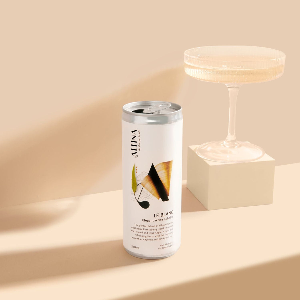 Altina Le Blanc 250ml, can beside a poured coupe, Scoop Wholefoods Cottesloe