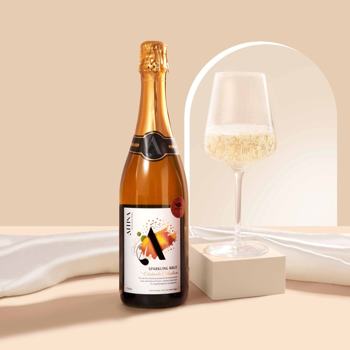 Altina Sparkling Brut 750ml, bottle beside a poured glass, Scoop Wholefoods Cottesloe