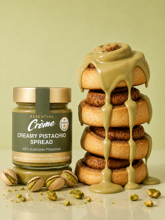 Creamy Australian Pistachio Spread poured over doughnuts